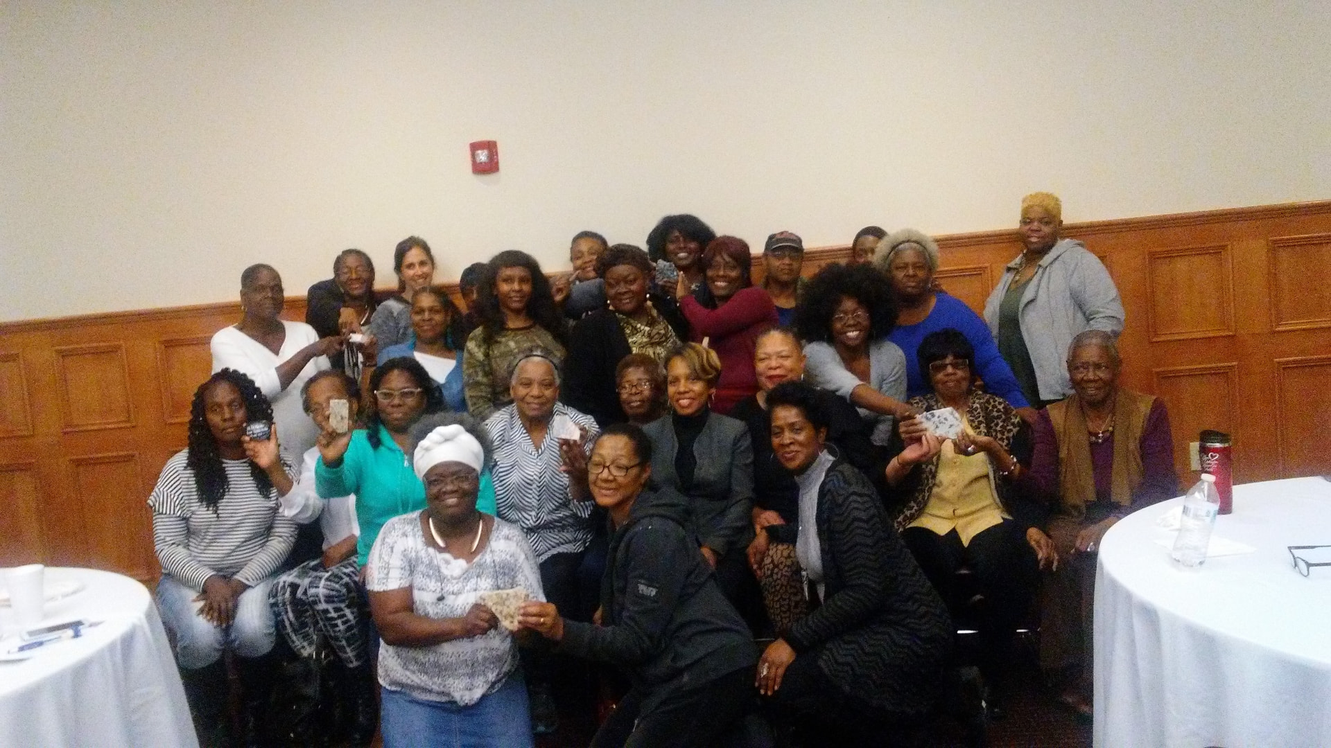 A large group of 5M women posing together at a gathering