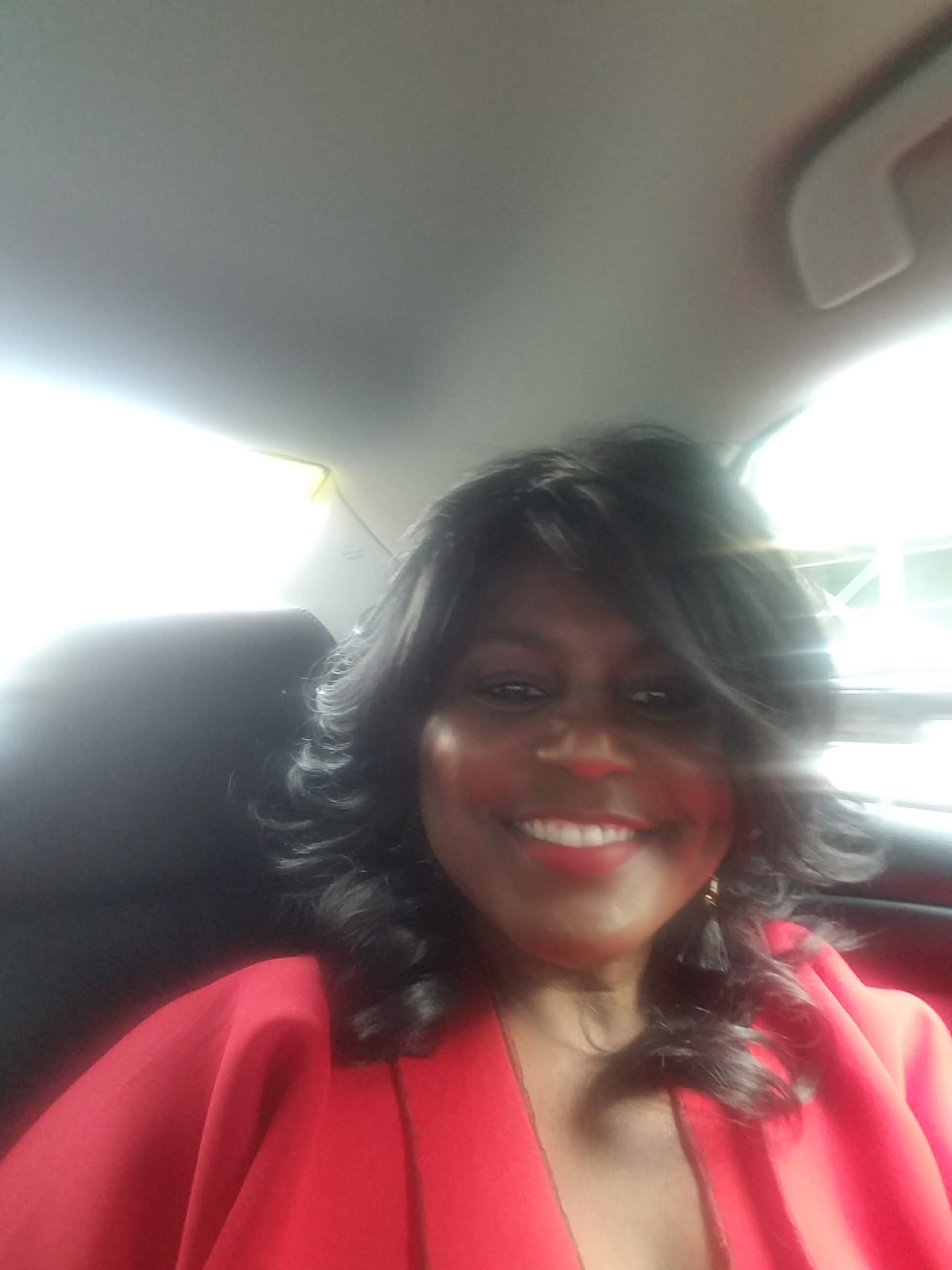 Cynthia Harper in red, on the way to the event