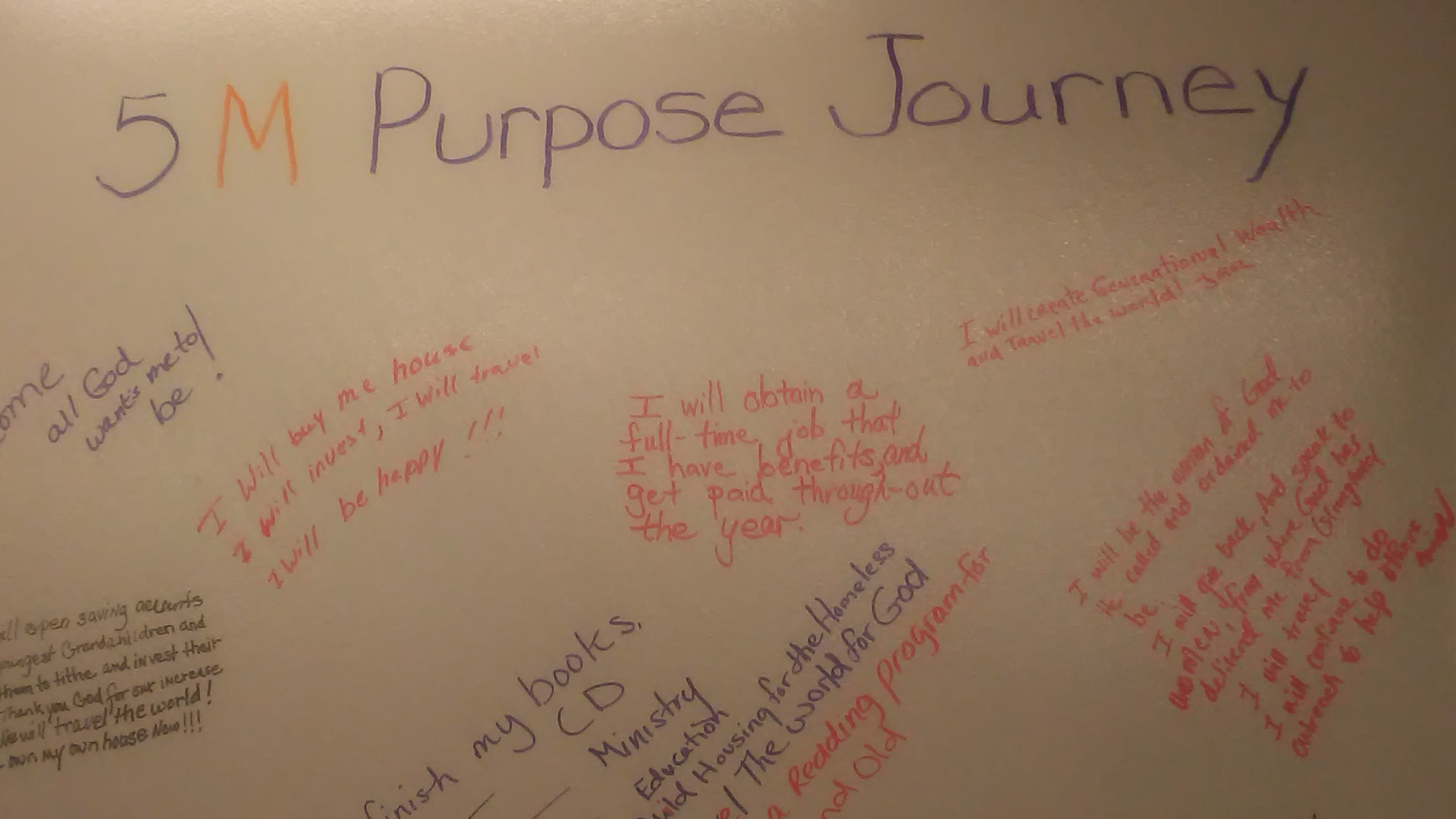 A flip chart titled 5M Purpose Journey covered with handwritten goals